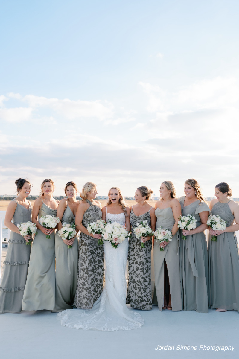 bride-bridesmaids-green-dresses-wedding-day-WEDDING-&-EVENTS-Outside-Sunset-Avalon-Yacht-Club